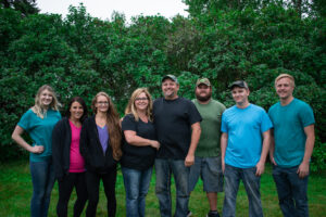 a family picture with colorful tshirts on